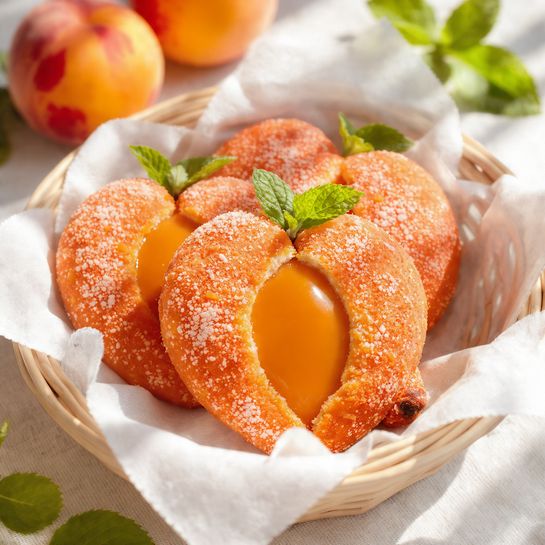 Whimsical Peach Cookies with Dulce de Leche Filling Recipe - Recipe Image